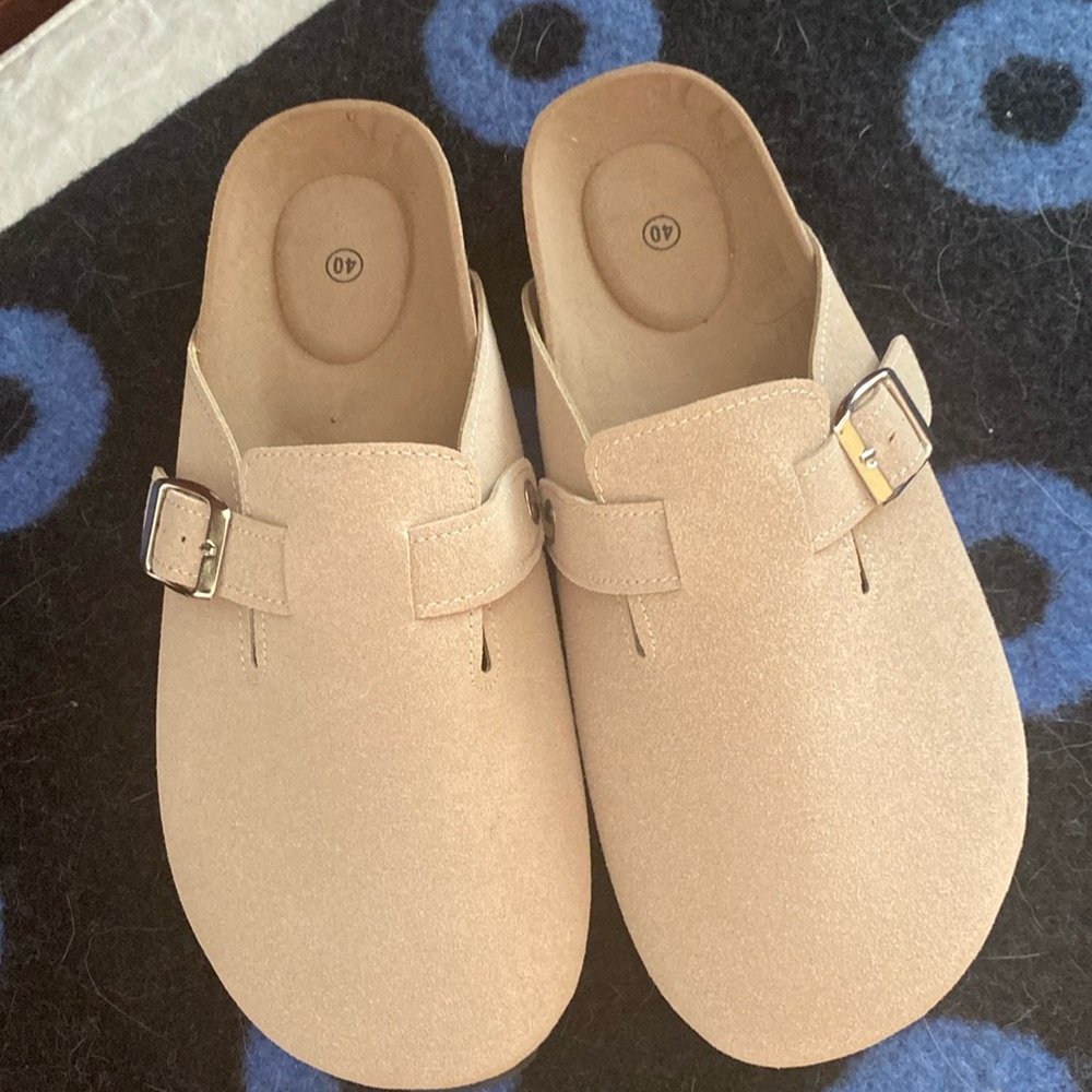 New Clogs that have never been worn.  Bought a size 40 and needed a 39.